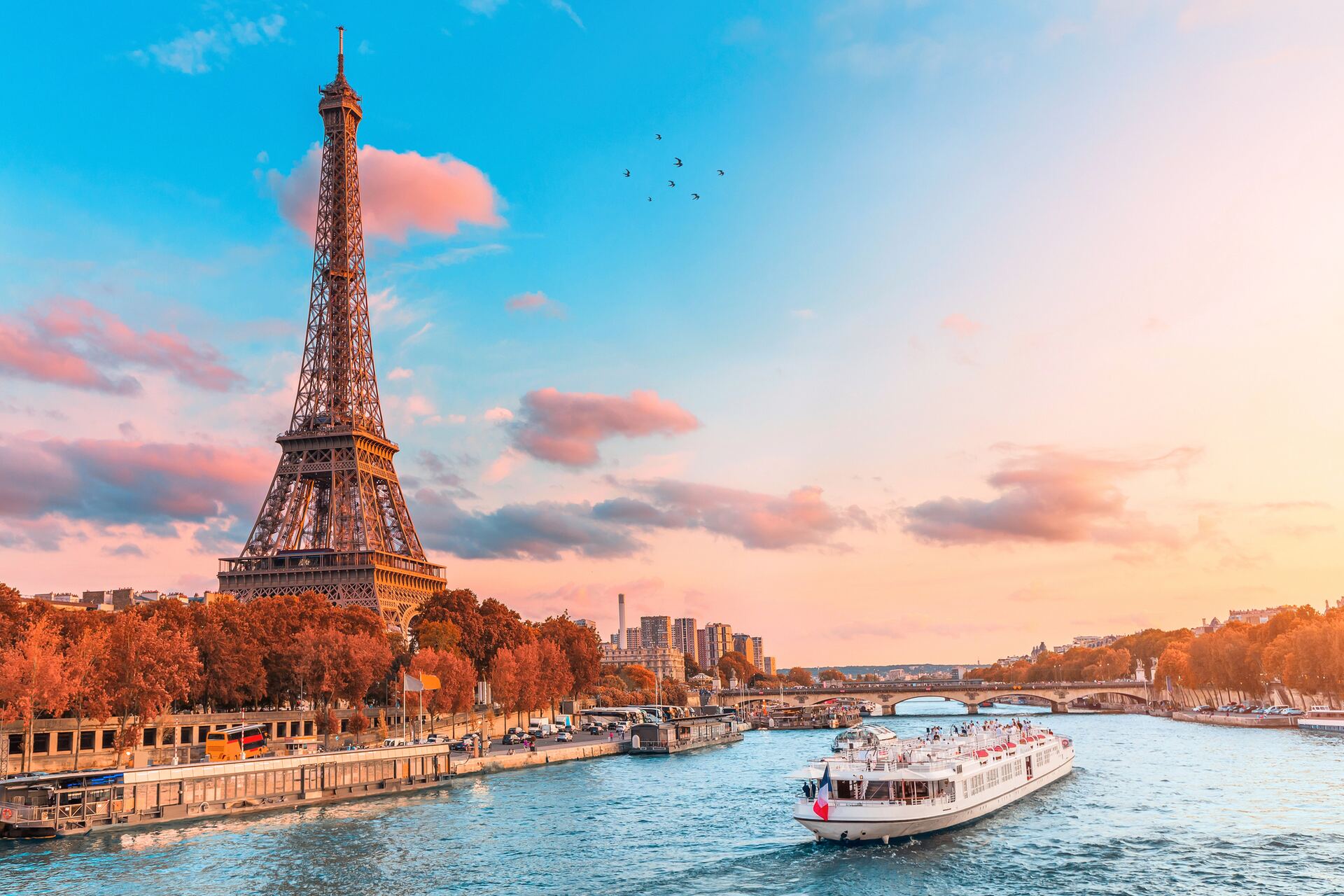 Bateau on the Seine at golden hour with Eiffel Tower in the background